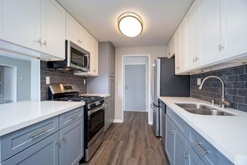 Steel Sink In Kitchen at El Patio Apartments, California